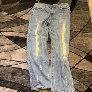 Women's Light Blue Distressed Jeans